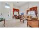 Spacious living area with tile flooring, chandelier, and natural light at 14842 Cedar Branch Way, Orlando, FL 32824