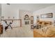 Cozy upstairs living room showcasing an exercise bike and comfortable seating area at 14842 Cedar Branch Way, Orlando, FL 32824