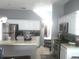 Bright kitchen featuring stainless steel appliances and light-colored cabinets at 16705 Rolling Green Dr, Clermont, FL 34714