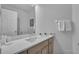 Bright bathroom featuring a single sink with a quartz countertop and updated fixtures at 16726 Hidden Spring Dr, Clermont, FL 34714