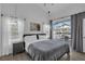 Bedroom featuring sliding glass doors to the outside patio at 16739 Hidden Spring Dr, Clermont, FL 34714