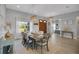 Dining room with an entryway into the bedroom and a view of the front door at 1679 E County Road 462, Wildwood, FL 34785