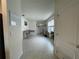 Bright foyer with tile flooring and a view into the dining area at 1799 Post Oak Dr, Davenport, FL 33837