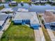Waterfront home with lush green lawn and private boat docks at 26608 E Cove Dr, Tavares, FL 32778