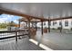 Wonderful wooden deck overlooking the water with a covered area offering ample space for relaxing outdoors at 26608 E Cove Dr, Tavares, FL 32778