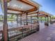 Beautiful waterfront dock with covered structure, boat lift and room for entertaining at 26608 E Cove Dr, Tavares, FL 32778
