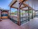 Waterfront dock with a covered structure and space for boat storage and entertaining guests at 26608 E Cove Dr, Tavares, FL 32778