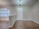 Welcoming entryway with a white door and a view to the next room at 26608 E Cove Dr, Tavares, FL 32778
