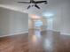Open floor plan with hardwood floors, high ceilings and chandeliers at 26608 E Cove Dr, Tavares, FL 32778
