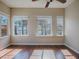 Living room featuring views of the water through the windows at 26608 E Cove Dr, Tavares, FL 32778