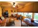 Relaxing sunroom featuring tile floors, lots of natural light and comfortable seating at 2682 Edwards Ln, The Villages, FL 32162