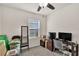 Bedroom featuring a large window, a ceiling fan, and closet space at 28026 Cypress Springs Loop, Okahumpka, FL 34762