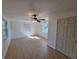 Bonus room features tile floor, neutral walls, two windows and two doors at 301 Clark St, Maitland, FL 32751