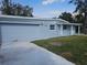 A single-story house with a garage and small, well-manicured front lawn at 301 Clark St, Maitland, FL 32751