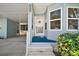 Cozy covered entrance leading to the front door of the home at 3323 Manatee Rd, Tavares, FL 32778