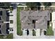 An aerial view highlights the property's roof, driveway, landscaping, and location at 339 Winter Nellis Cir, Winter Garden, FL 34787