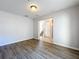 Bedroom with wood-style flooring, natural light, and closet at 339 Winter Nellis Cir, Winter Garden, FL 34787