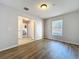 Bedroom with wood-style flooring, natural light, and closet at 339 Winter Nellis Cir, Winter Garden, FL 34787