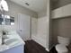 Bathroom with dual sinks and a shower/tub combination with white tile surround at 3605 Conroy Rd # 535, Orlando, FL 32839