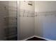 Walk-in closet with white wire shelving for organization at 3605 Conroy Rd # 535, Orlando, FL 32839