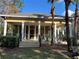 Charming community pool house with decorative pillars and lush landscaping at 3605 Conroy Rd # 535, Orlando, FL 32839