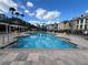 The community pool offers clear, refreshing water with easy access steps and depth markers at 3605 Conroy Rd # 535, Orlando, FL 32839