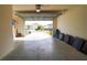 Garage with open door, view of the street, and ample storage space at 3780 Viscaya Ct, The Villages, FL 32163