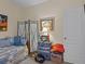 Comfortable spare bedroom featuring daybed with patterned covers and accent decor at 3808 Serena Ln, Clermont, FL 34711