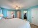 Bright main bedroom with closet access and en-suite bathroom at 3847 Eversholt St, Clermont, FL 34711