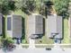 Aerial view of home showcasing roof, driveway, and proximity to neighboring houses in a residential neighborhood at 4078 Waltham Forest Dr, Tavares, FL 32778