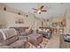 Cozy living room with neutral paint colors and vaulted ceilings at 4078 Waltham Forest Dr, Tavares, FL 32778