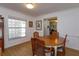 Dining room with natural light and a vintage wooden dining set at 4830 Tellson Pl, Orlando, FL 32812