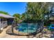 Backyard pool featuring secure fencing for safety and privacy, ideal for relaxation and recreation at 4830 Tellson Pl, Orlando, FL 32812