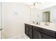 Bathroom featuring double sinks and a large mirror at 4903 Windermere Ave, Kissimmee, FL 34746