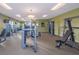 Community gym featuring state-of-the-art Matrix fitness equipment and mounted televisions, for a convenient workout experience at 4903 Windermere Ave, Kissimmee, FL 34746