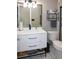 Contemporary bathroom featuring a modern vanity, toilet, and sleek black fixtures at 519 Balsawood Ct, Altamonte Springs, FL 32714