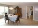 Dining room with a view outside, light fixture, and china cabinet at 519 Balsawood Ct, Altamonte Springs, FL 32714