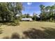 Expansive backyard offers space and privacy for outdoor activities at 5200 Ne 20 St, Ocala, FL 34470