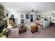 Expansive main bedroom with fireplace, seating area, and generous closet space at 5200 Ne 20 St, Ocala, FL 34470