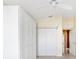 Bedroom featuring built in wardrobe, neutral colored walls, and ceiling fan at 544 Audrey Ln, The Villages, FL 32162