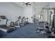 Well-equipped fitness center with modern cardio machines and weight training equipment, offering convenience for residents at 559 Juniper Springs Dr, Groveland, FL 34736