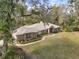 Stunning aerial view of the house showcasing its expansive lot and meticulous landscaping at 580 Mercers Fernery Rd., Deland, FL 32720