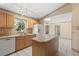 Bright kitchen with an island and a view of the trees outside the window at 580 Mercers Fernery Rd., Deland, FL 32720