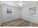 Cozy bedroom with ceiling fan and natural light at 6490 Se 180Th Avenue Rd, Ocklawaha, FL 32179