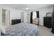 Comfortable bedroom showcases a calm atmosphere with a ceiling fan and well-placed furnishings at 701 Brigadoon Cir, Leesburg, FL 34788