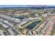 Aerial view of townhomes near area attractions, offering convenient access to local destinations at 7581 Oak Spring Ln, Davenport, FL 33837