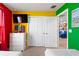 Bright, colorful bedroom featuring playful Mario-themed decor and modern white furniture at 7581 Oak Spring Ln, Davenport, FL 33837