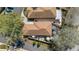 Aerial view showcases the home's layout, backyard patio, outdoor areas, and the surrounding neighborhood at 922 Cancun Ct, The Villages, FL 32159