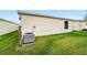 Backyard showing the air conditioner at 17454 Se 81St Newberry Ct, The Villages, FL 32162