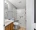 Bathroom featuring a modern glass shower and a sleek vanity at 17454 Se 81St Newberry Ct, The Villages, FL 32162